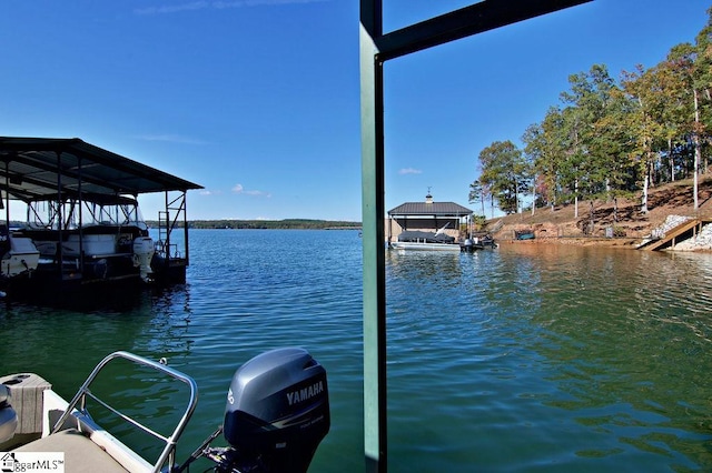 dock area with a water view