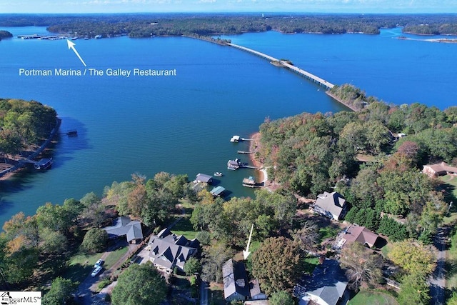 birds eye view of property featuring a water view