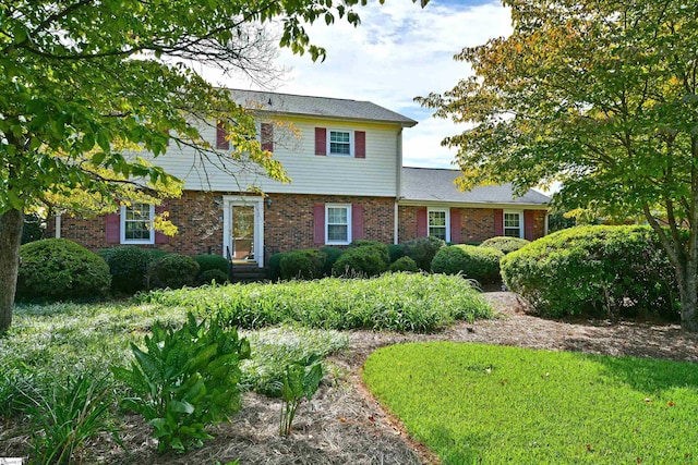 view of front of home with a front yard