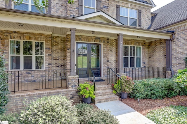 doorway to property with covered porch