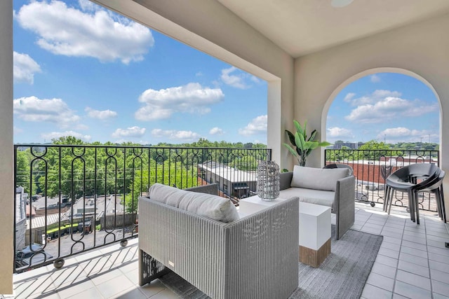 exterior space with an outdoor living space and a balcony