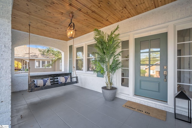 property entrance with a porch