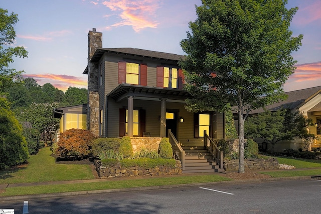 view of front of property featuring covered porch