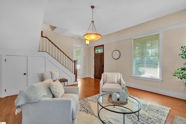 living room with light hardwood / wood-style flooring