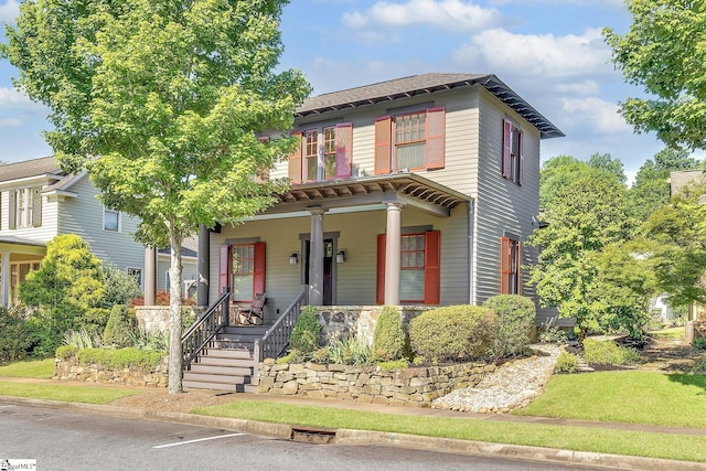 view of front of property featuring covered porch