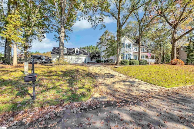 view of front of home with a front lawn