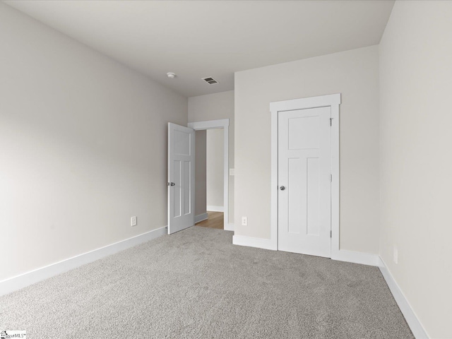 unfurnished bedroom featuring carpet floors