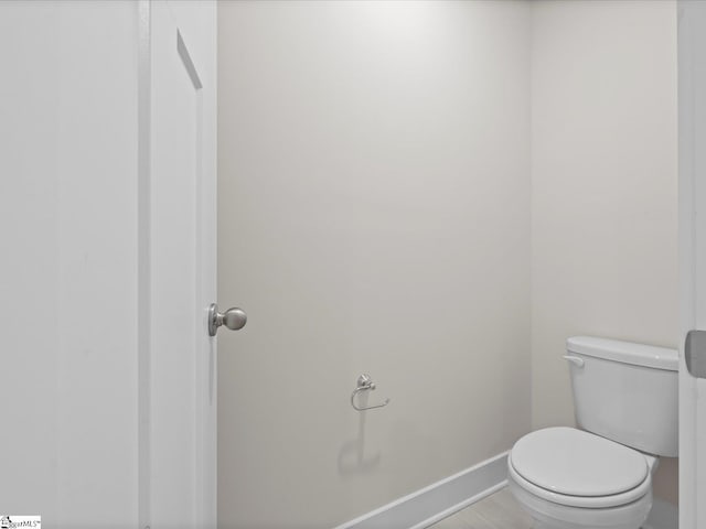 bathroom featuring toilet