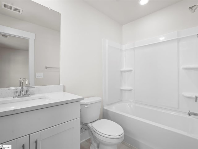 full bathroom with shower / tub combination, vanity, and toilet