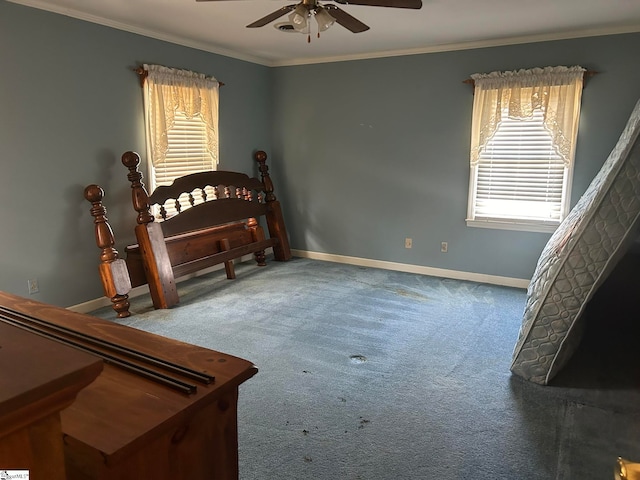 bedroom featuring carpet, ceiling fan, and crown molding