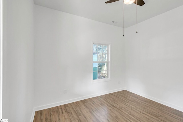 unfurnished room featuring ceiling fan and wood-type flooring