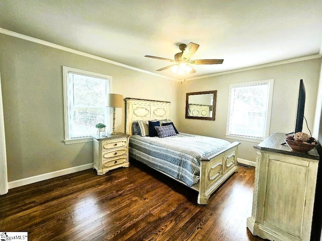 bedroom featuring ceiling fan, dark hardwood / wood-style floors, and crown molding