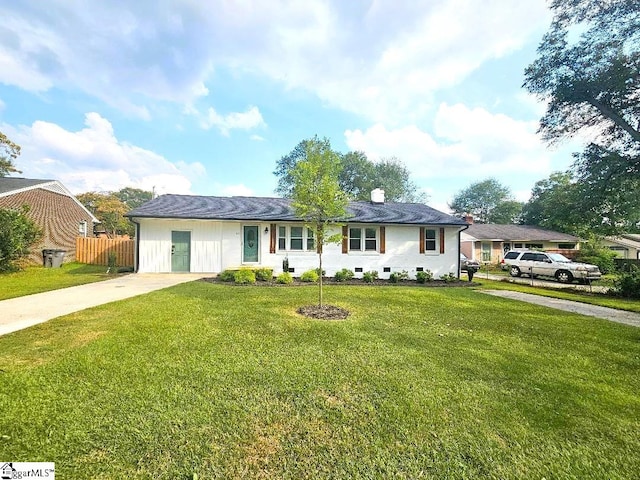 ranch-style house with a front lawn