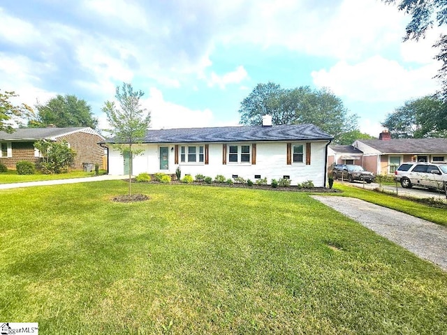 ranch-style house with a front lawn