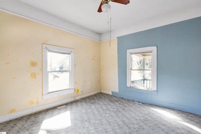 315 Poole St, Woodruff, SC 29388 - carpeted empty room with ceiling fan