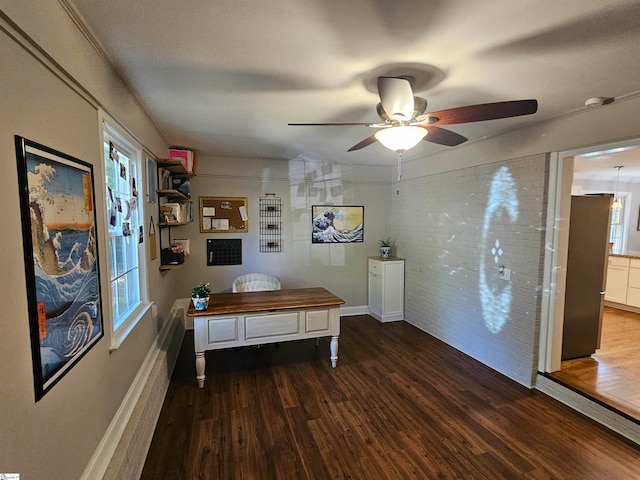 office area with dark hardwood / wood-style flooring and ceiling fan