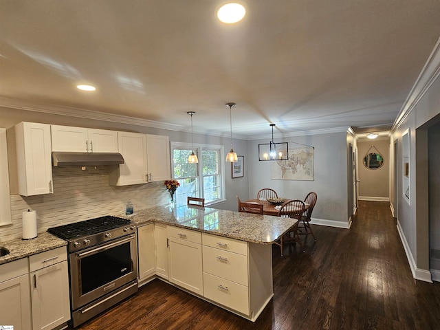 kitchen with white cabinetry, stainless steel stove, dark hardwood / wood-style floors, pendant lighting, and kitchen peninsula