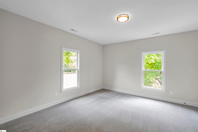 empty room with carpet flooring