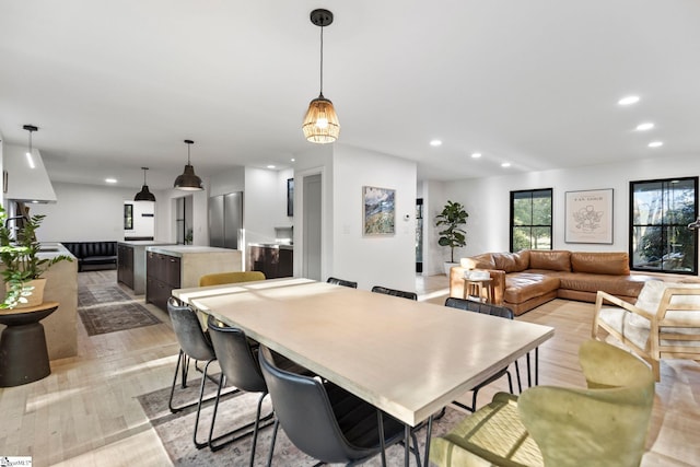 dining room with light hardwood / wood-style floors