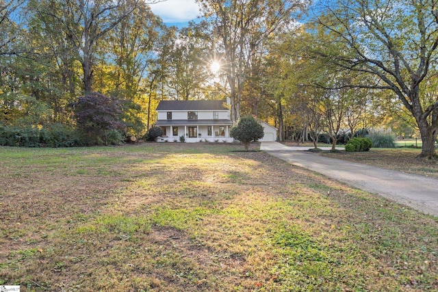 view of front of property featuring a garage and covered porch