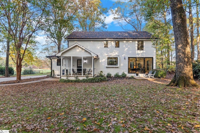 view of front of home with a patio and a porch