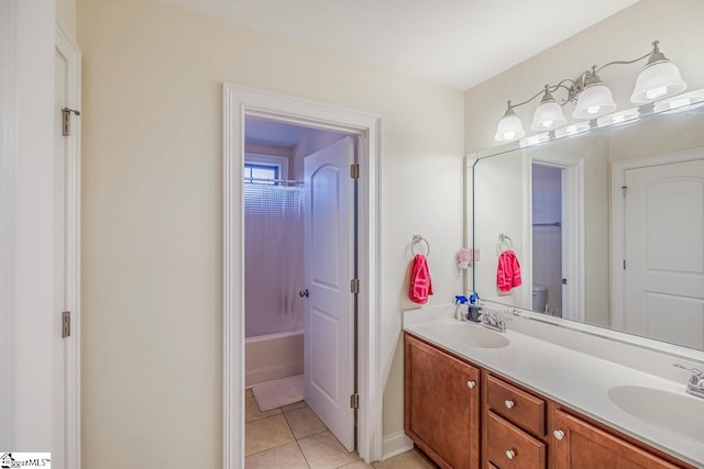 full bathroom featuring vanity, tile patterned floors, bathing tub / shower combination, and toilet