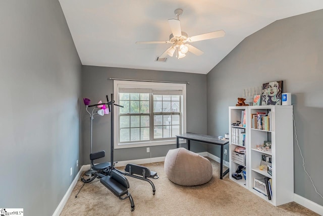 workout room with carpet floors, ceiling fan, and vaulted ceiling