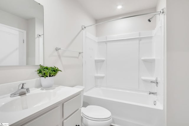 full bathroom with vanity, toilet, and shower / tub combination