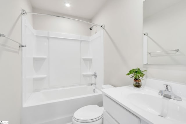 full bathroom featuring shower / bathing tub combination, vanity, and toilet