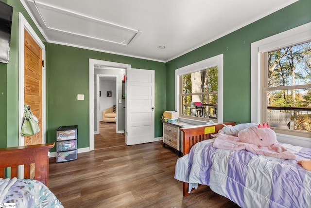 bedroom featuring dark hardwood / wood-style floors and crown molding