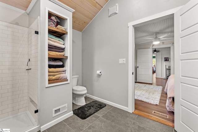 bathroom featuring wood-type flooring, vaulted ceiling, wood ceiling, ceiling fan, and walk in shower