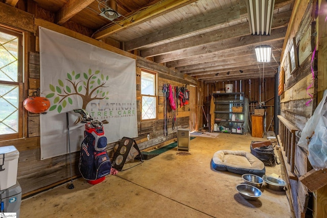 miscellaneous room with a wealth of natural light and concrete flooring