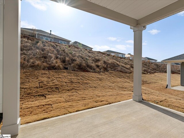 view of yard with a patio area