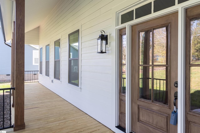 entrance to property with covered porch