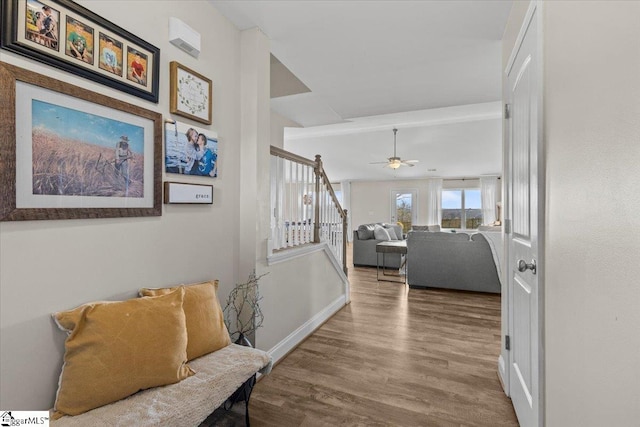 hallway featuring hardwood / wood-style flooring