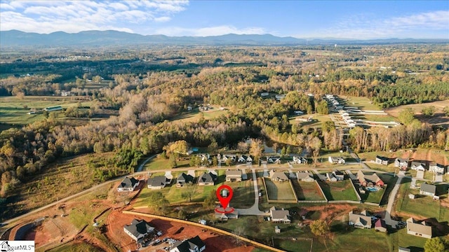 bird's eye view with a mountain view