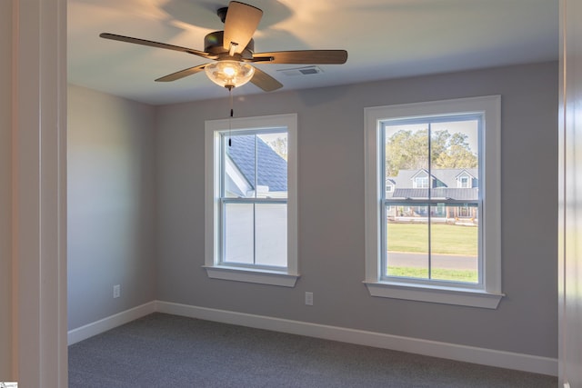 unfurnished room featuring carpet floors and ceiling fan