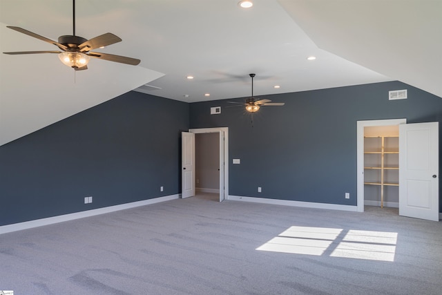 interior space with light carpet and ceiling fan