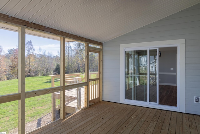 unfurnished sunroom with wood ceiling and vaulted ceiling