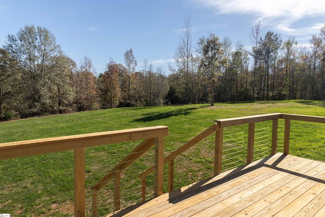 deck featuring a yard