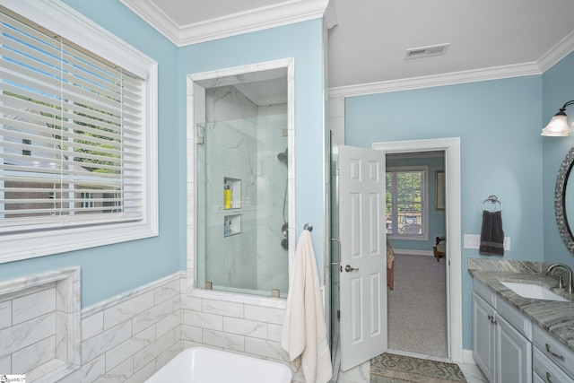 bathroom with vanity, ornamental molding, and plus walk in shower