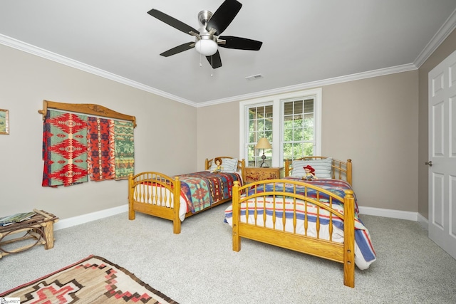 bedroom featuring carpet flooring, ceiling fan, and ornamental molding