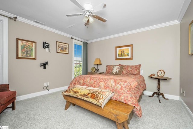 bedroom featuring ceiling fan, carpet floors, and ornamental molding