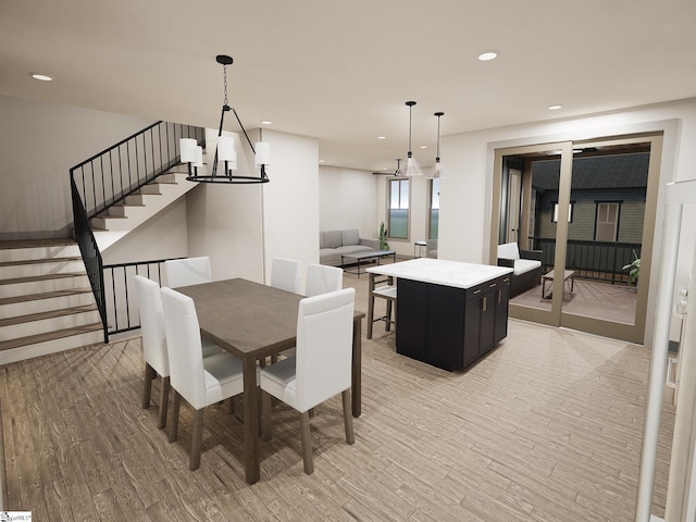 dining area featuring light wood finished floors, stairway, and recessed lighting