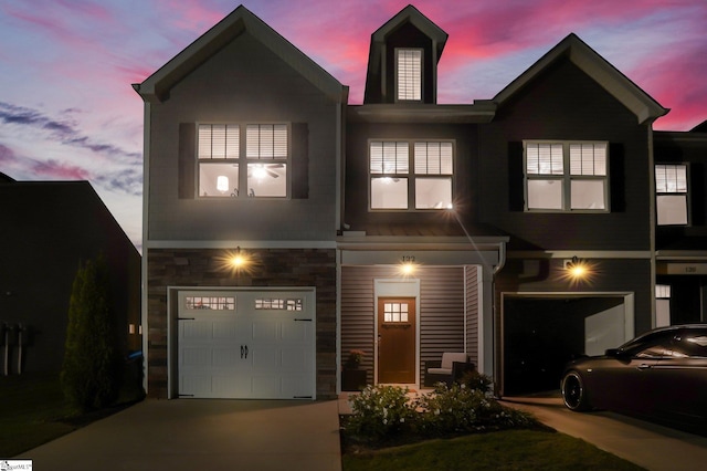 view of front of property featuring a garage