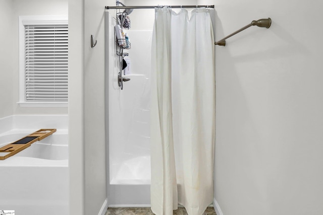 bathroom with a shower with shower curtain