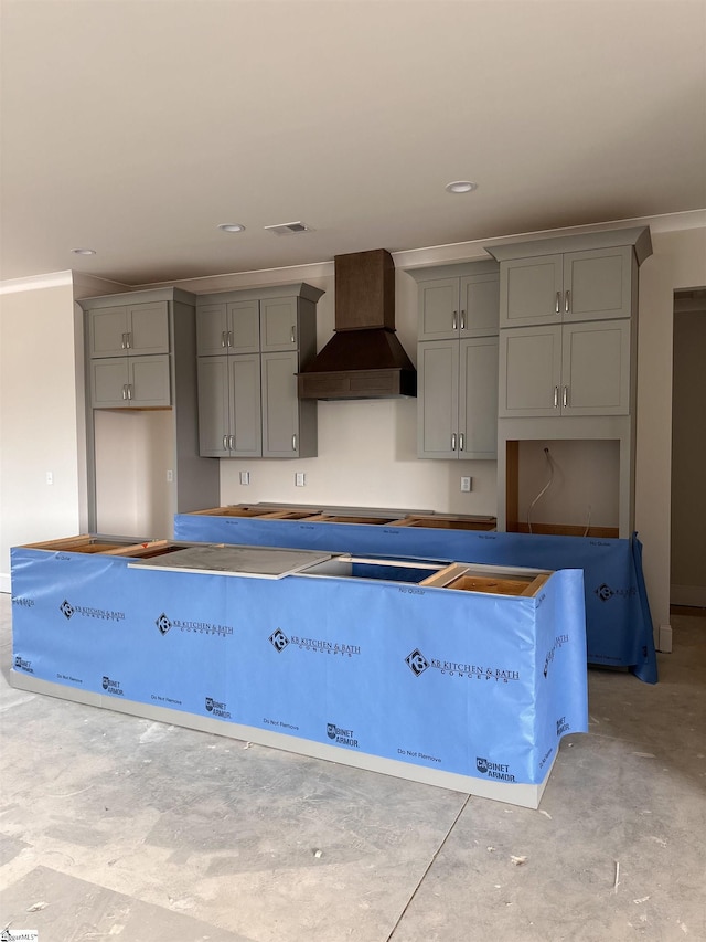 108 Cambie Pl, Greenville, SC 29607 - kitchen featuring custom range hood, gray cabinets, ornamental molding, recessed lighting, and concrete floors
