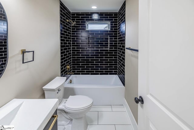 full bathroom with tile patterned flooring, vanity, toilet, and tiled shower / bath combo