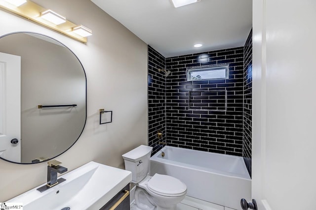 full bathroom with tiled shower / bath combo, toilet, and vanity