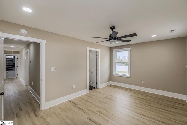 unfurnished bedroom featuring light hardwood / wood-style floors and ceiling fan